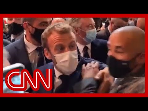 French President Macron hit with egg during event