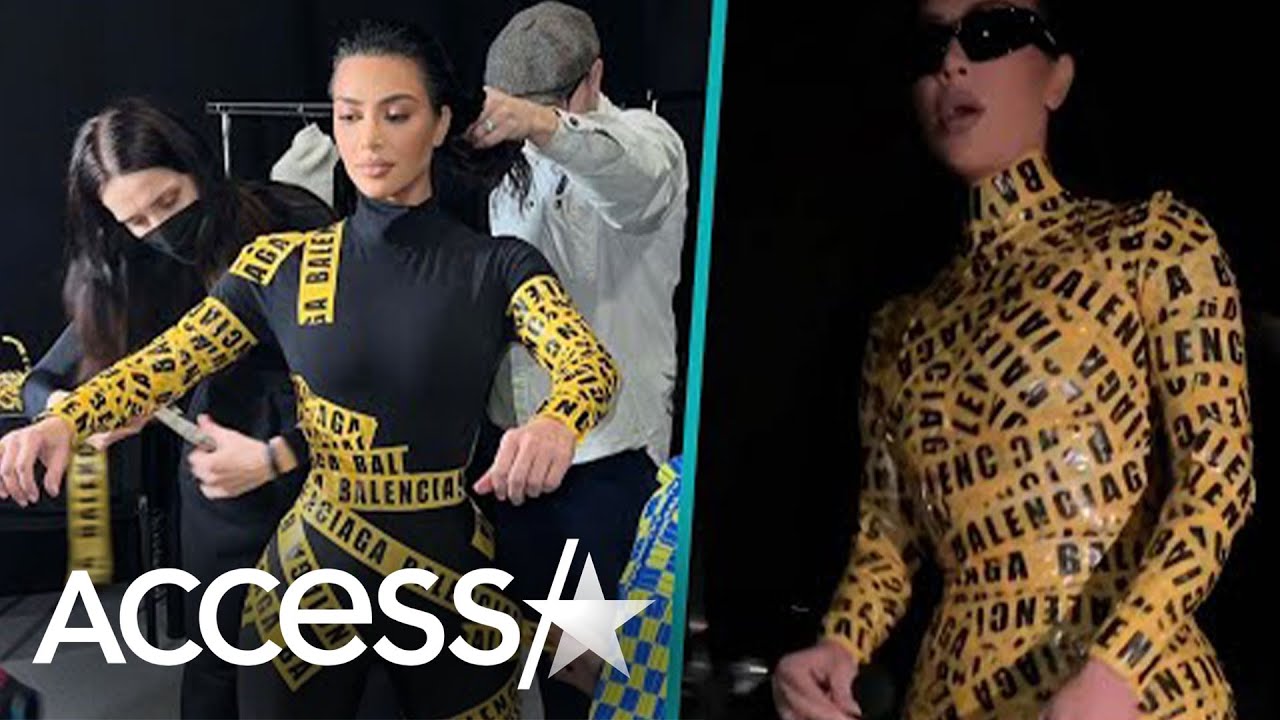 Kim Kardashian Struggles To Sit In Balenciaga Catsuit Made Of Caution Tape